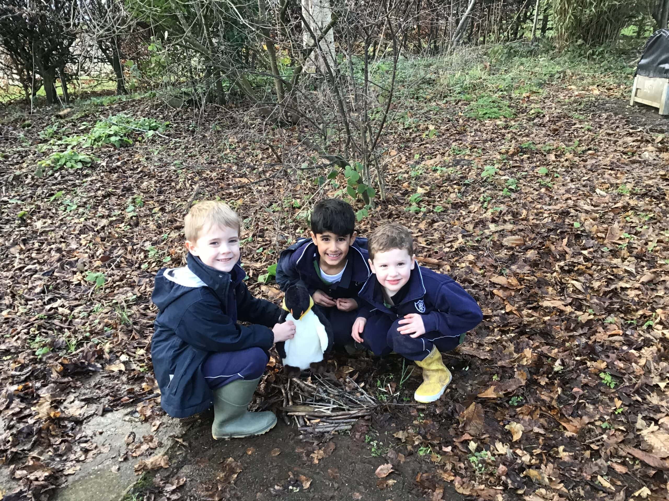 Children learning in leafy outdoor environment