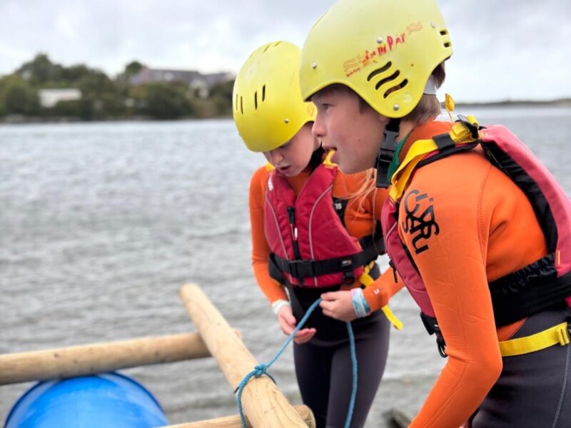 Pupils building a raft
