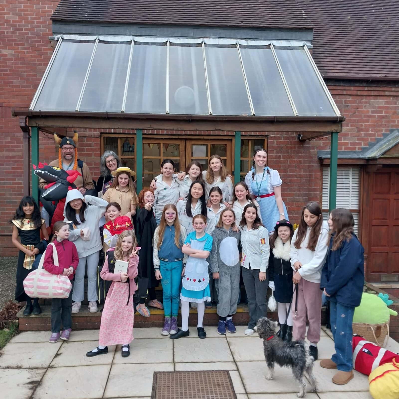 Group of school children dressed up as world book day characters