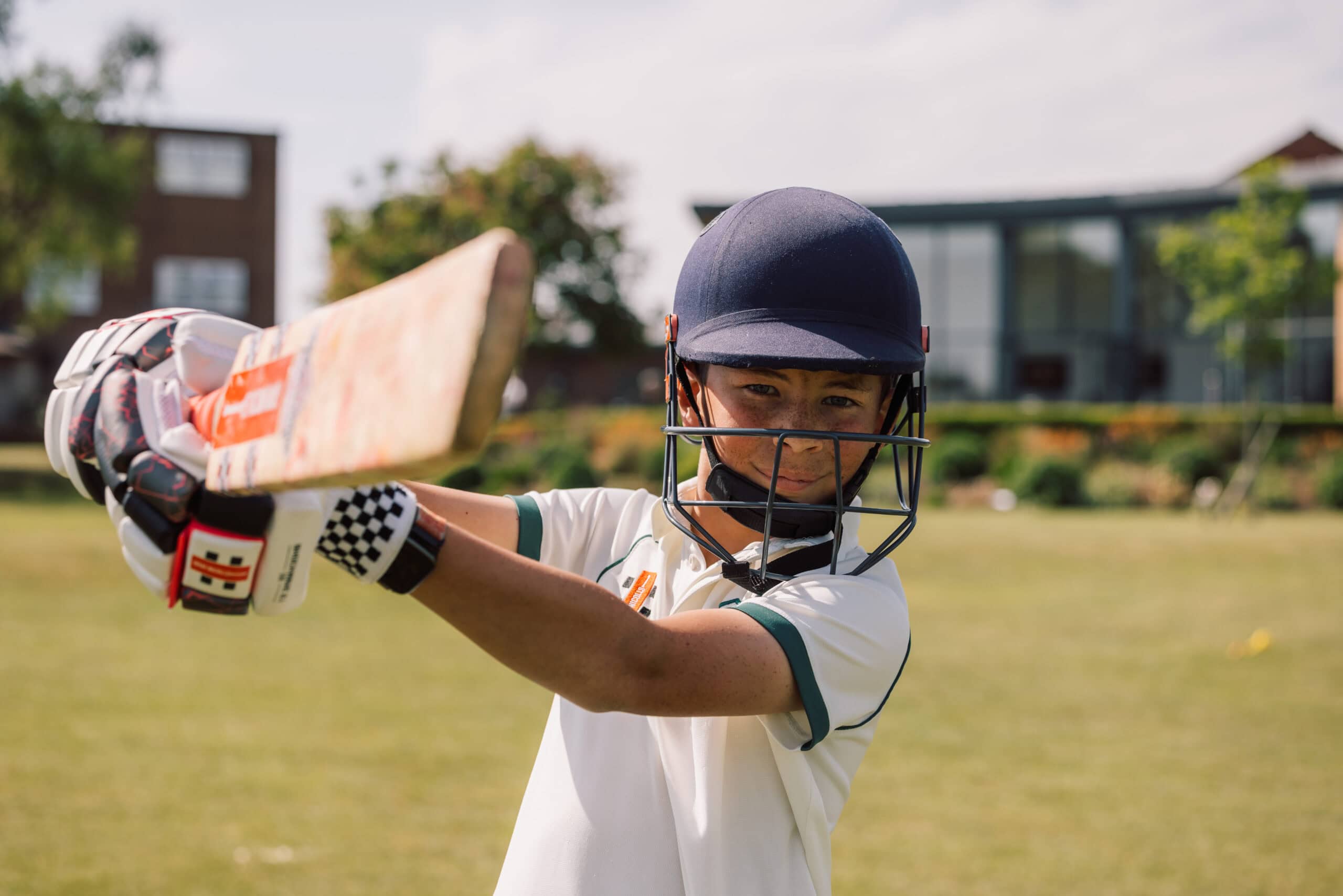 Young cricketer holding cricket bat