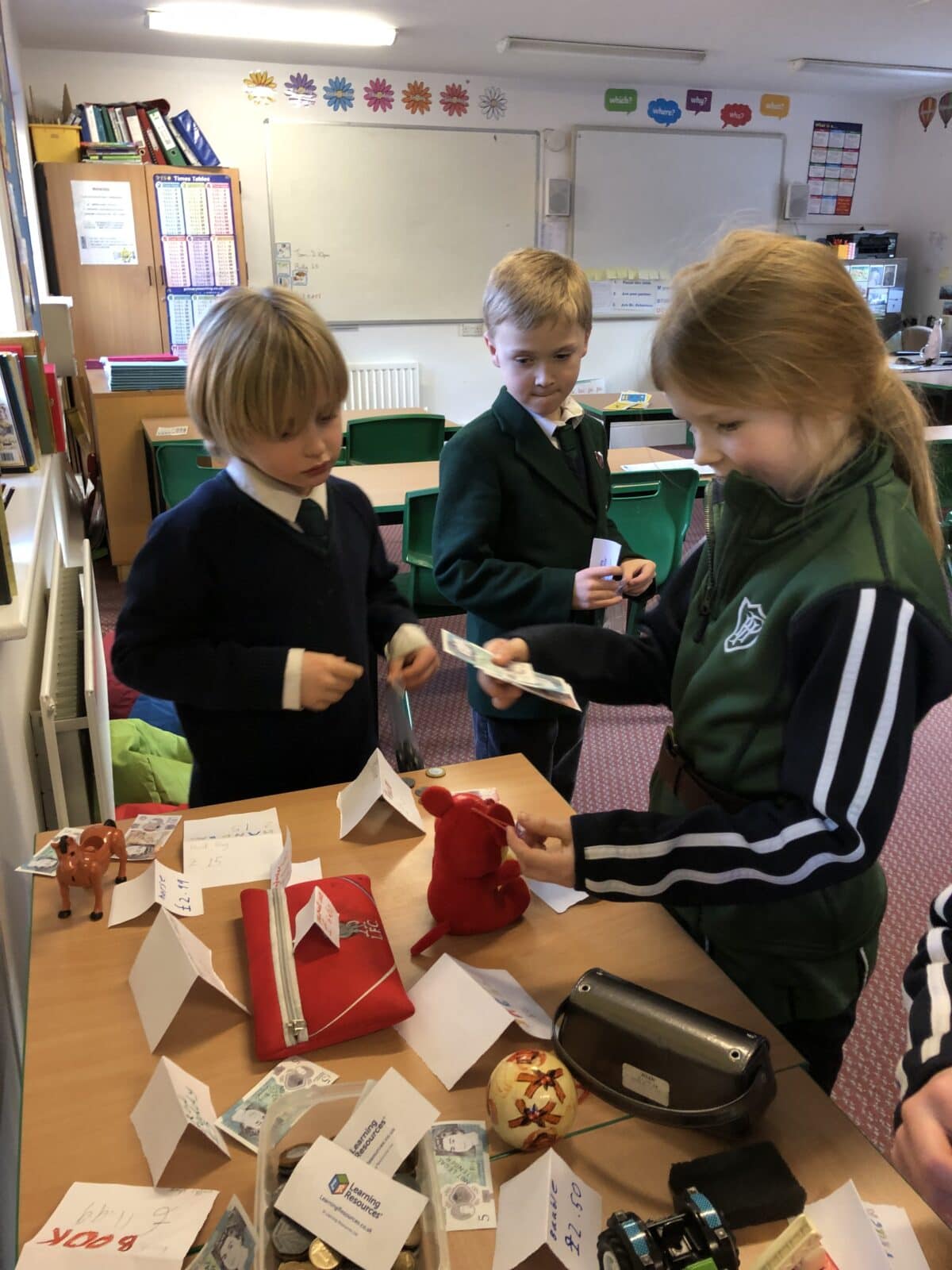 Children learning maths in a fun classroom environment