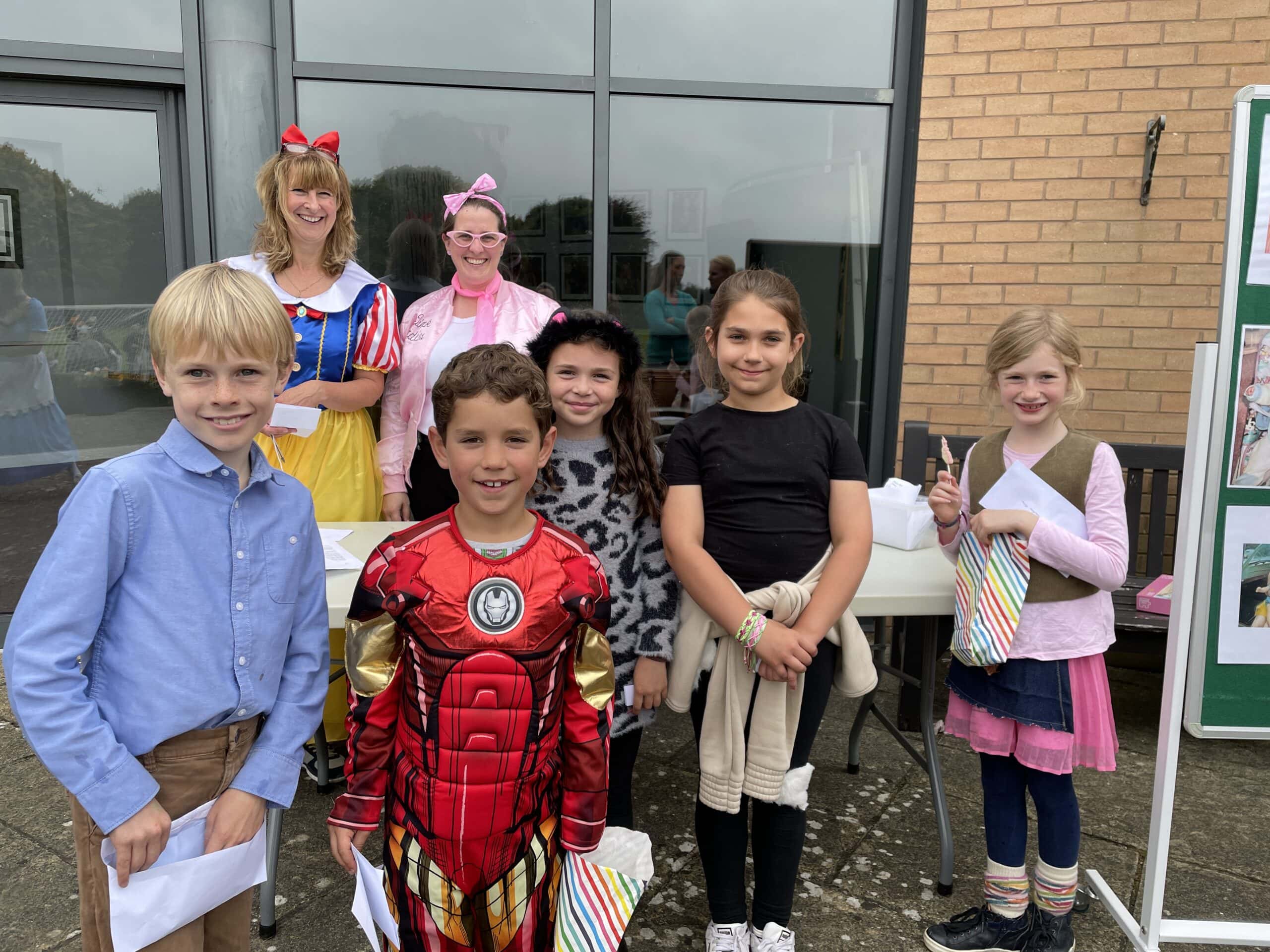 Children and teachers dressed as movie characters