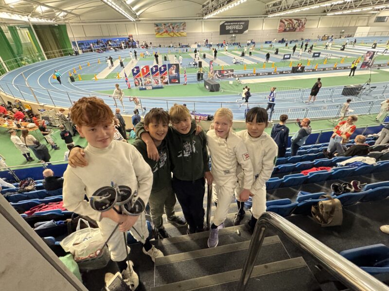 Five Packwood pupils all wearing fencing gear, ready to compete
