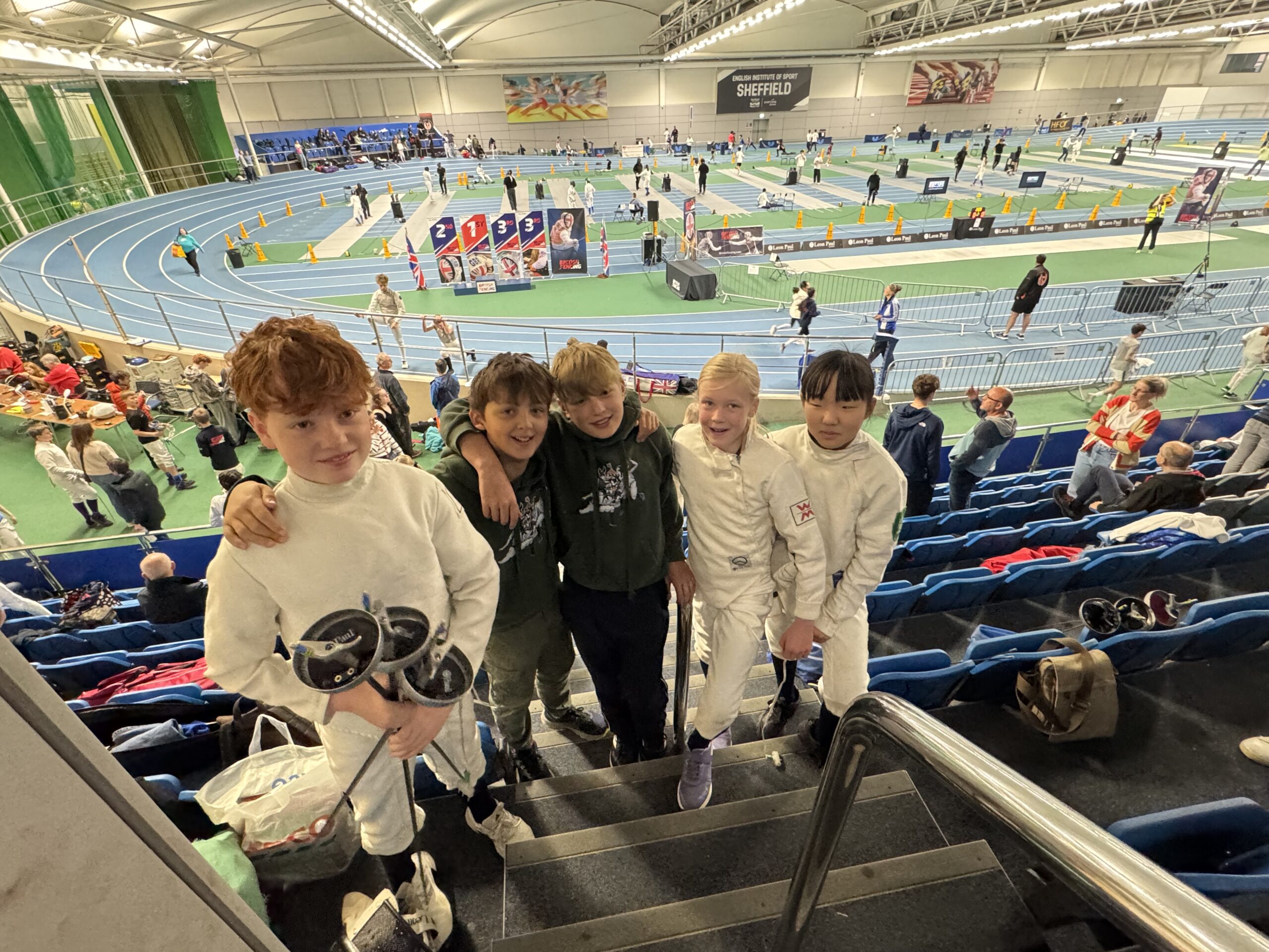 Five Packwood pupils all wearing fencing gear, ready to compete