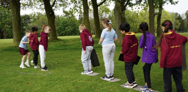Pupils doing outdoor teambuilding