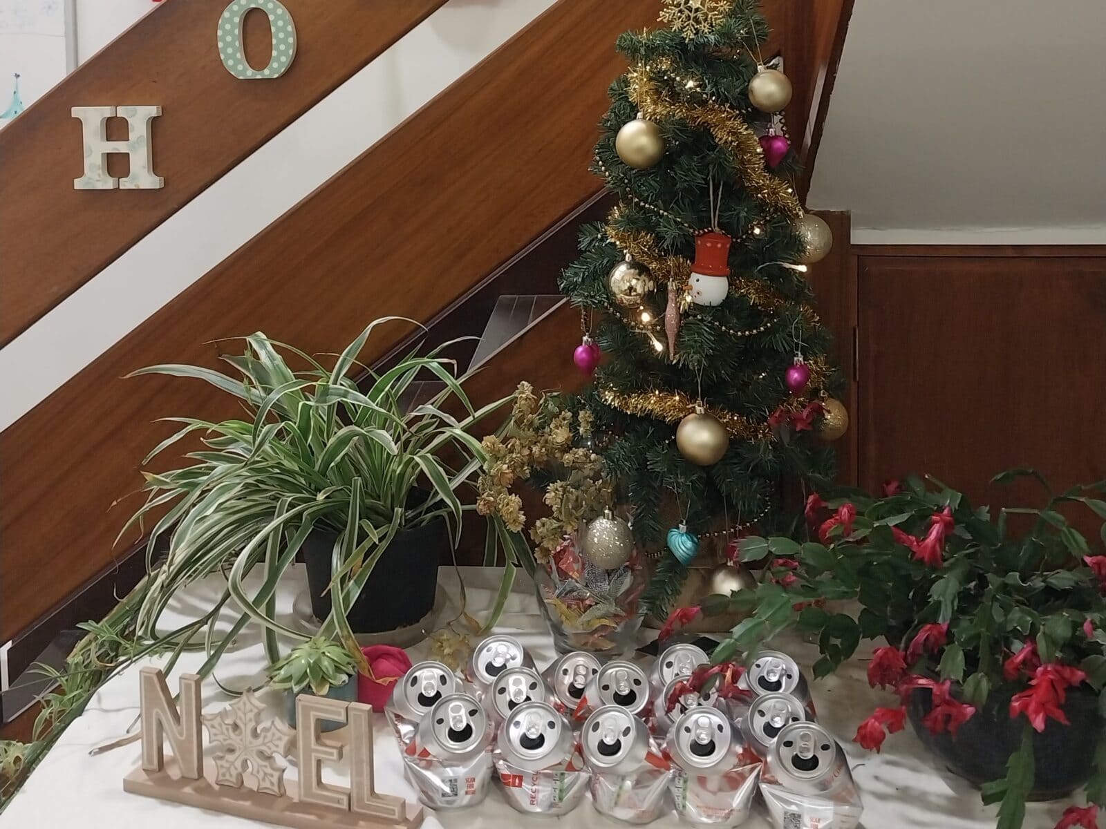 Cosy entrance hall to a boarding house, decorated for Christmas