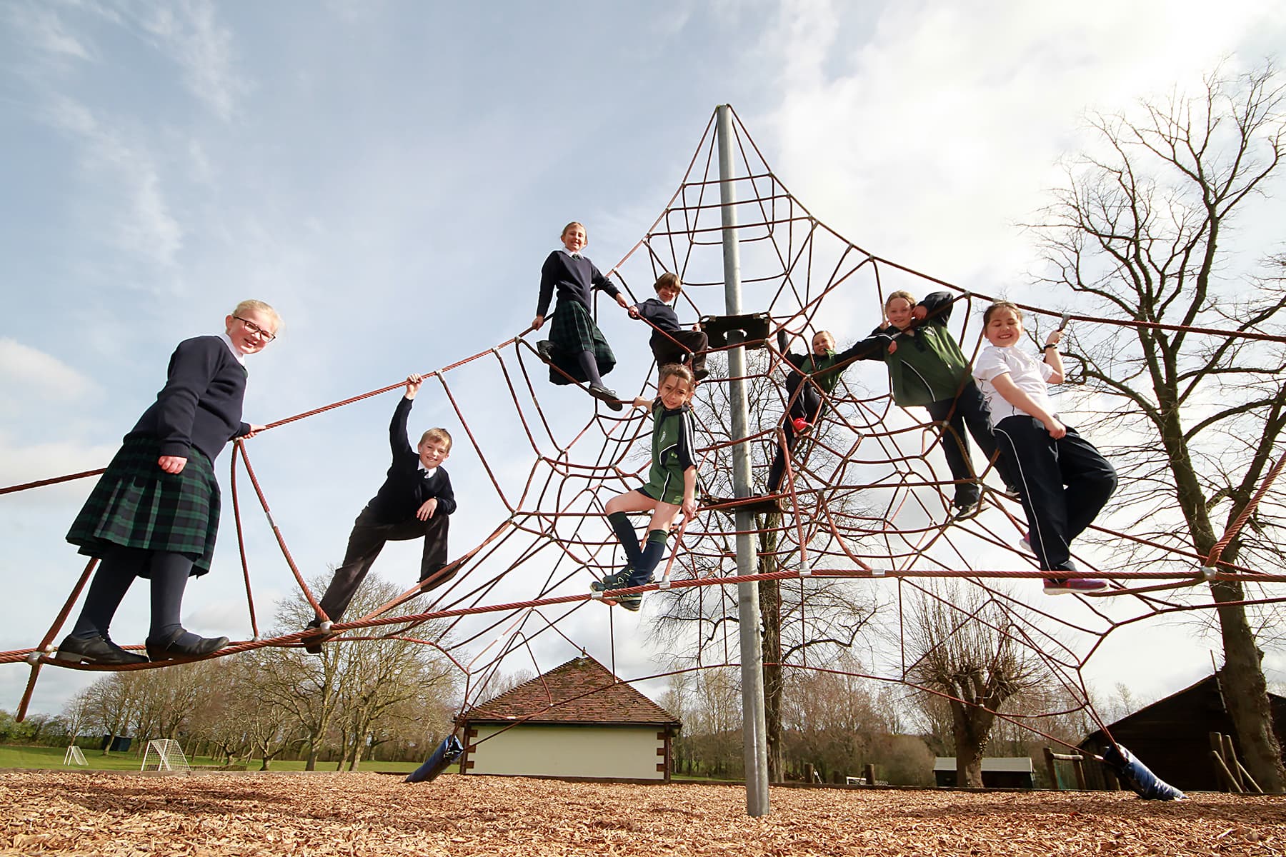 Children playing on space net