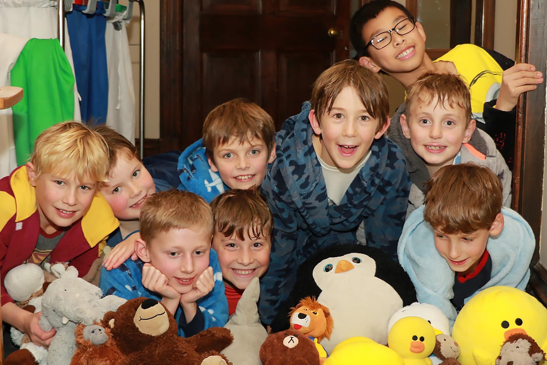 Boys relaxing in boarding house