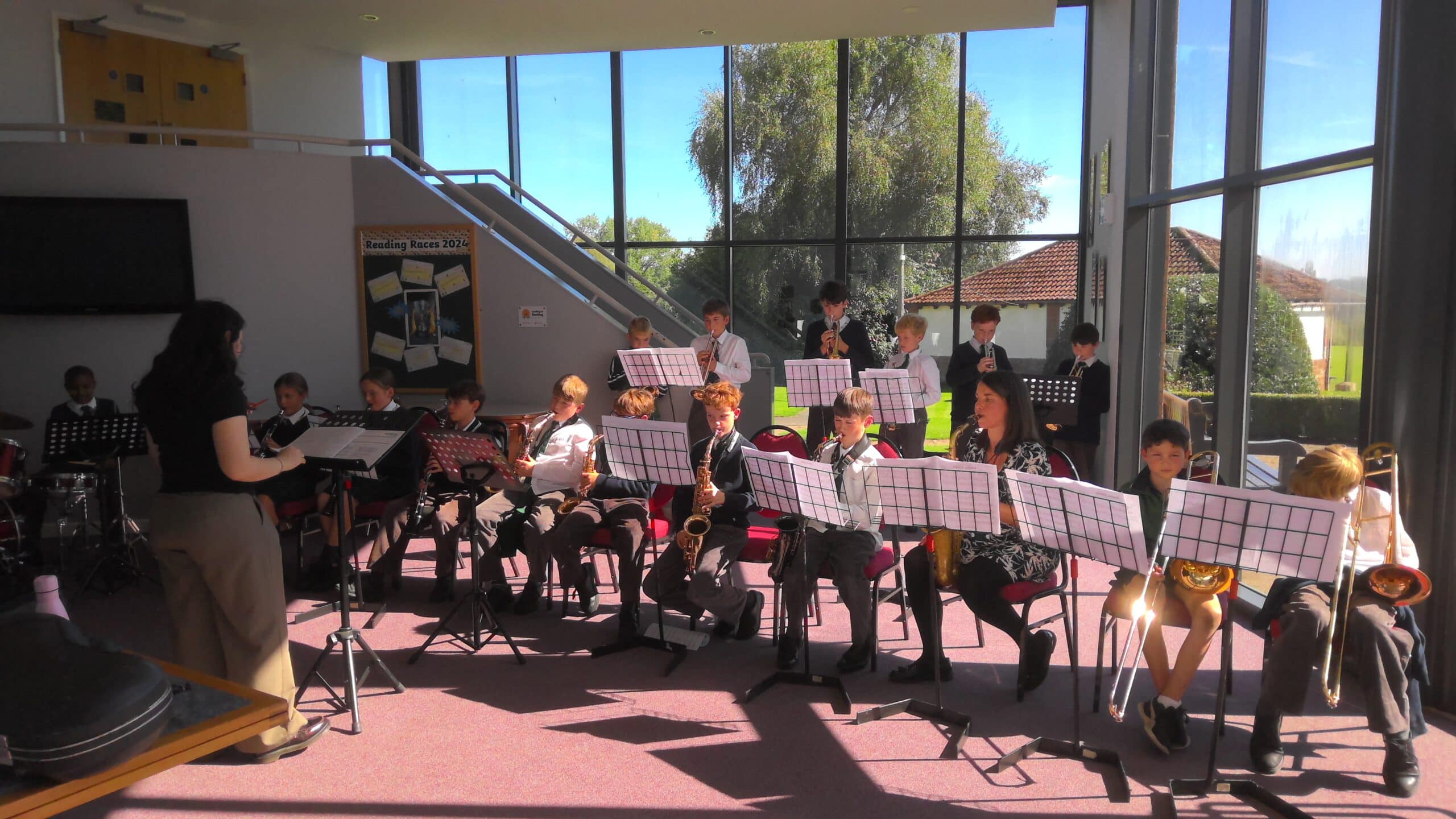 A group of school children rehearsing together as a band