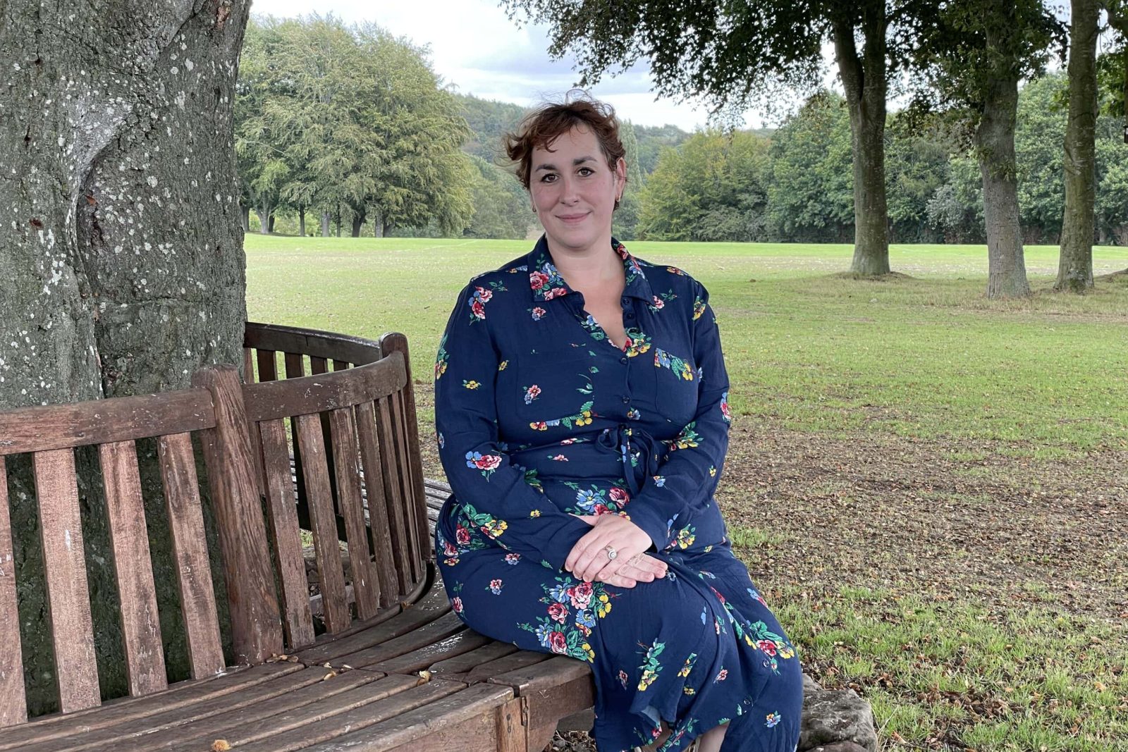 Packwood Assistant Head sitting beneath tree